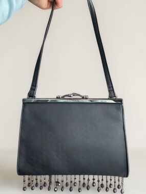 Guess Shoulder bag / Clutch with kiss lock closure mauve beaded fringe